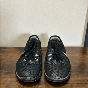 Black Woman’s Nike Running Shoes